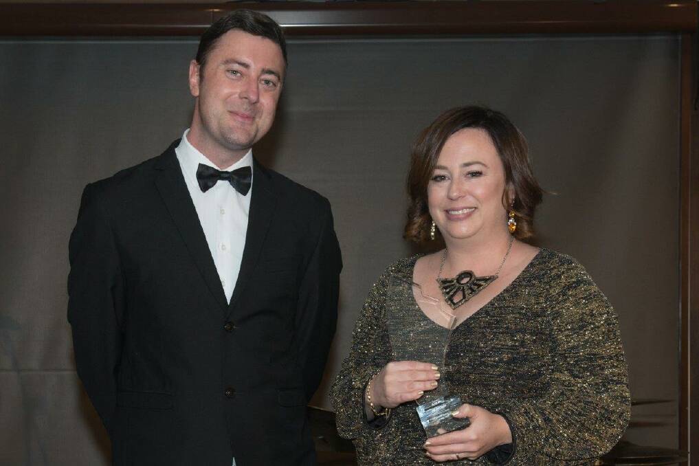 WIN: The Educator editor Brett Henebery with Rising Star award winner, Lisa Scobie from Kurri Kurri High School, at the Australian Education Awards on August 16.