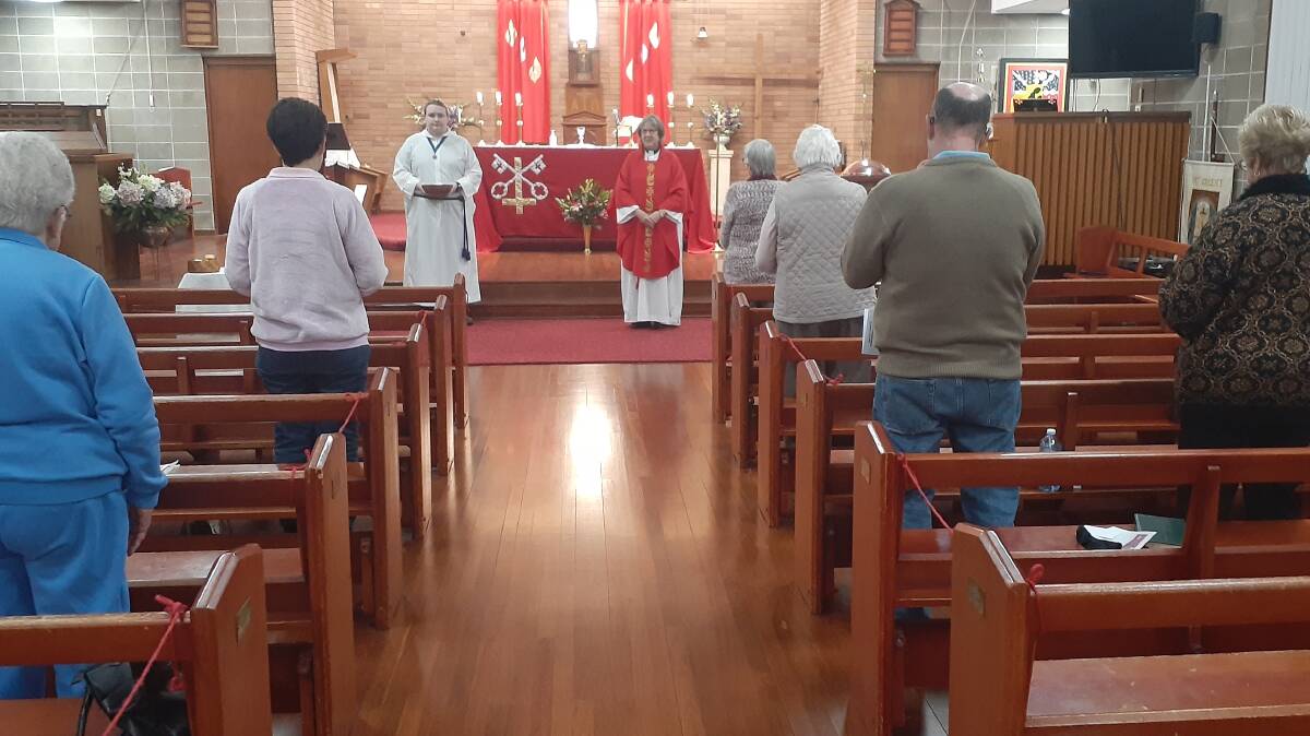 WELCOME BACK: Mother Theresa Angert-Quilter prepares to lead a socially-distanced church service at St Paul's Kurri Kurri on Saturday evening.