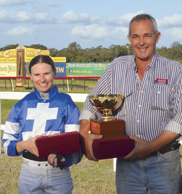 SWEET VICTORY: Jockey Rachael Murray and trainer David Callaughan after Profiler's win in the Jungle Juice Cup at Cessnock Racecourse on Monday. Picture: Krystal Sellars
