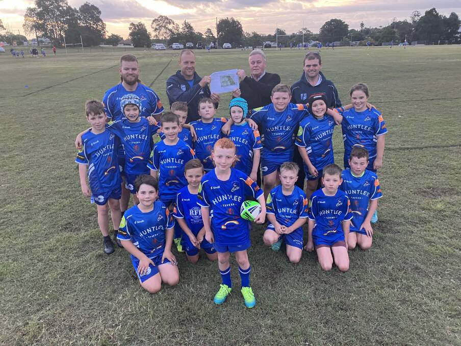 SUPPORT: One Nation candidate for Hunter, Dale McNamara with Greta-Branxton Colts officials and players at Greta Central Oval on Tuesday.