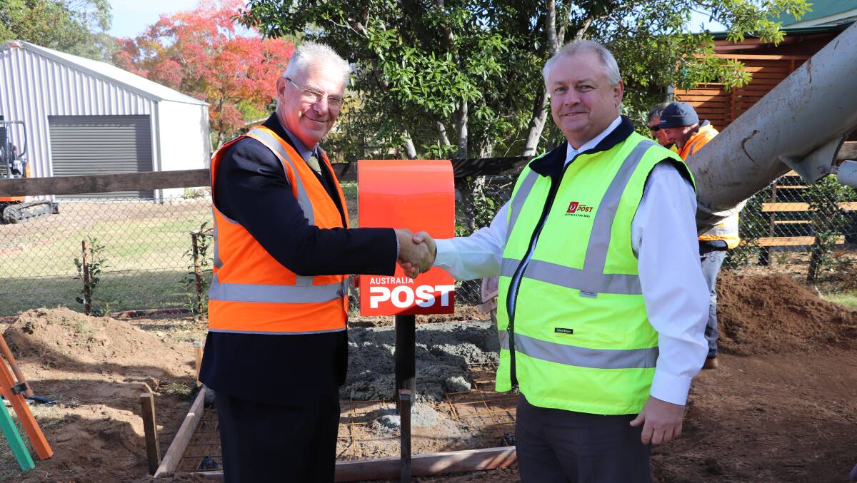 SERVICE: Cessnock mayor Bob Pynsent and Australia Post Rural North manager Neil Stig at the newly-installed mailbox at Mulbring.  