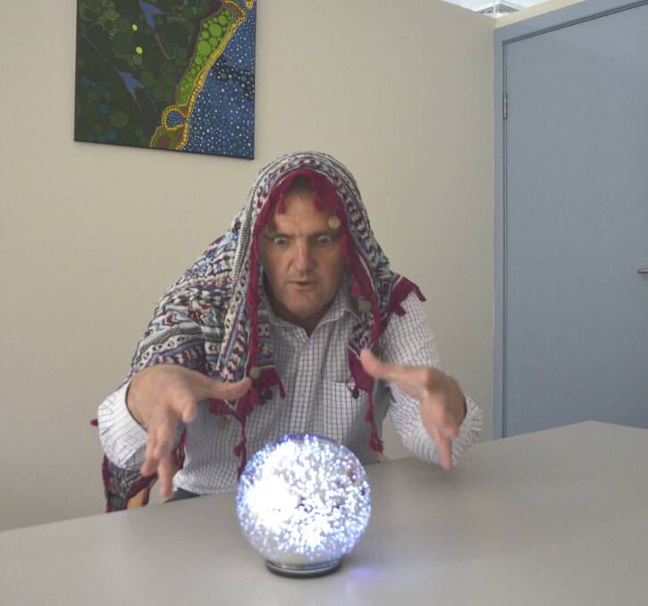 TONGUE-IN-CHEEK: Member for Cessnock Clayton Barr gazes into the crystal ball for a look at what may happen in 2020.