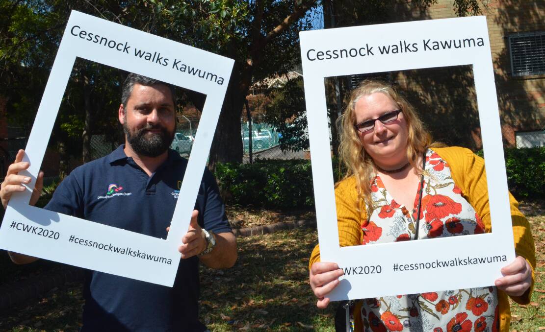 MESSAGE: Will Doran and Cessnock Hospital social work student Chrissy Young, supporting the Cessnock Walks Kawuma photo campaign.