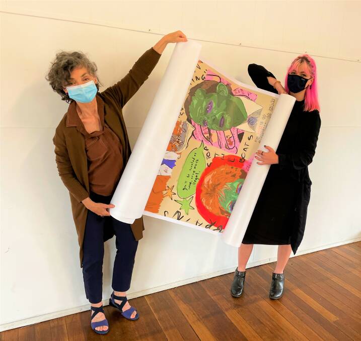 THE BIG REVEAL: Merryn Hull and Jada-Lee Stevenson prepare to unveil Jada-Lee's work for the Cessnock Contemporary exhibition. Picture: Krystal Sellars