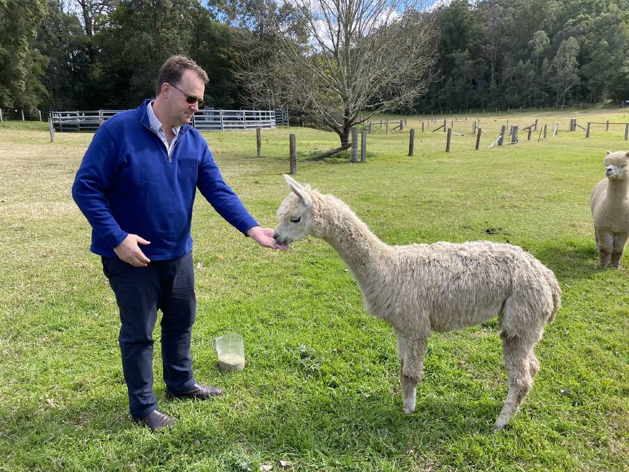 ENGAGEMENT: Rounding Up principal Tony Eyres meets one of the locals at Laguna's Little Valley Farm. Picture: supplied