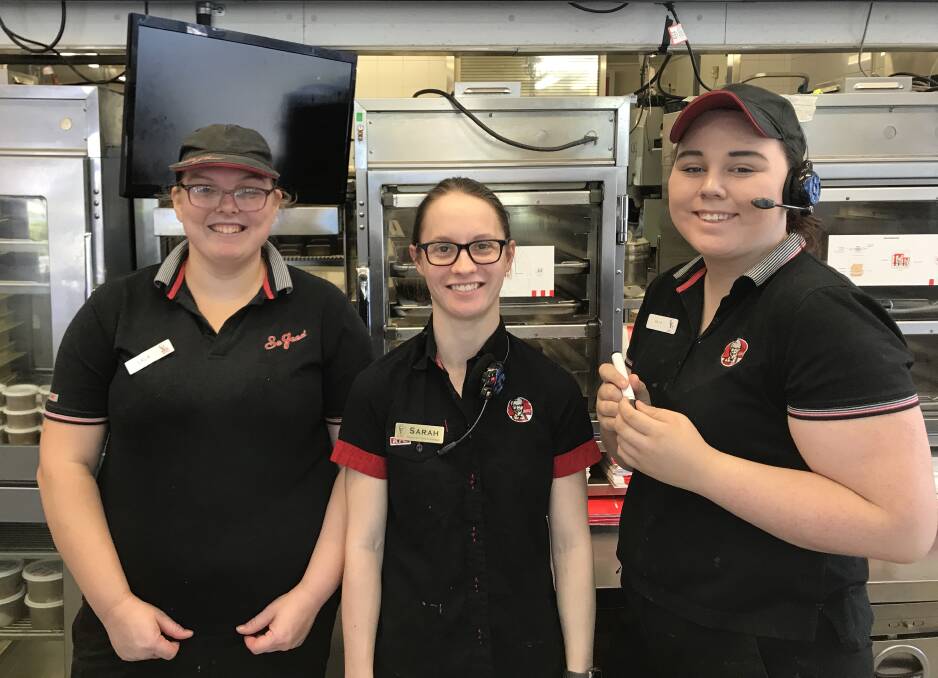 GREAT SERVICE: KFC Cessnock staff Lara Peters, Sarah Kay-Herring and Aria Luzon.
