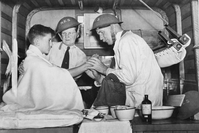 EFFORT: Volunteers from a mobile NES unit demonstrate first aid techniques in 1942. Picture: Australian War Memorial