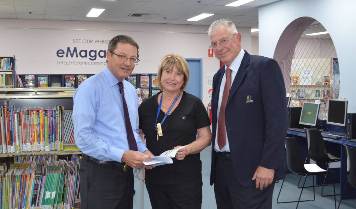 COMMUNITY HUB: Parliamentary Secretary for the Hunter Scot MacDonald, Cessnock City Library services coordinator Rose-marie Walters and Cessnock mayor Bob Pynsent at Kurri Kurri Library, which received a $127,859 grant.