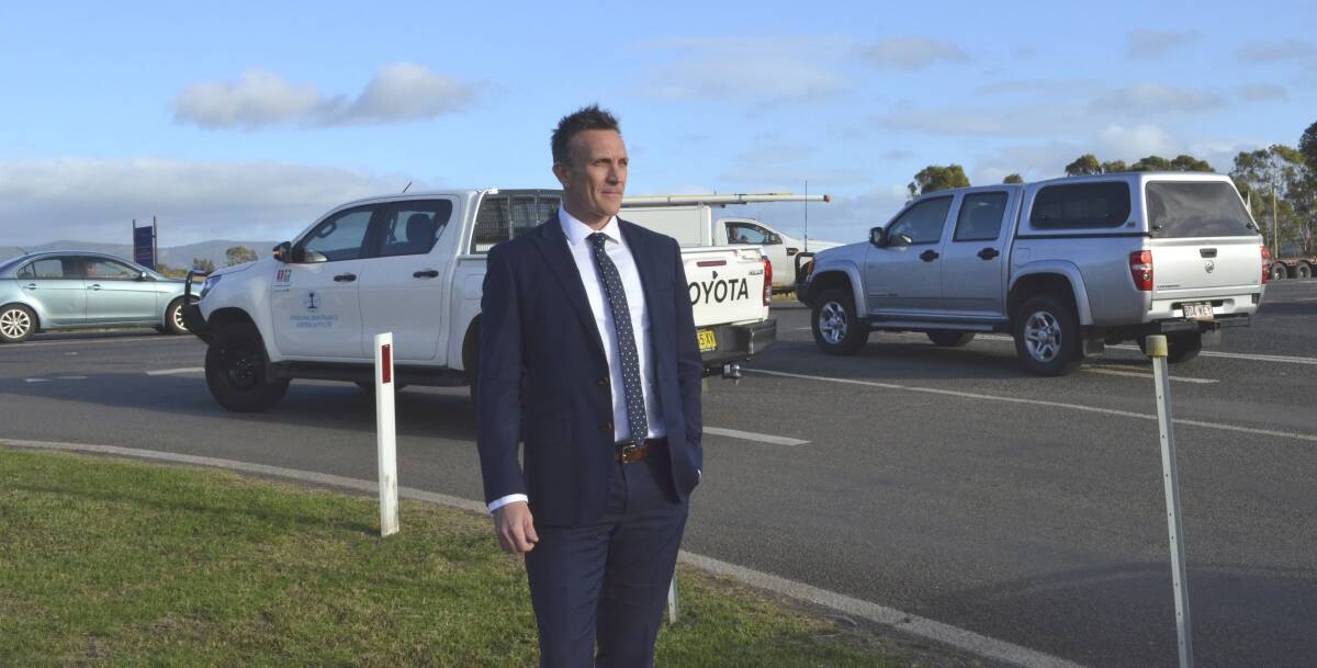 CONCERNS: St Philip's Christian College Cessnock principal Darren Cox observes the traffic on Lomas Lane on Monday morning. Picture: Krystal Sellars