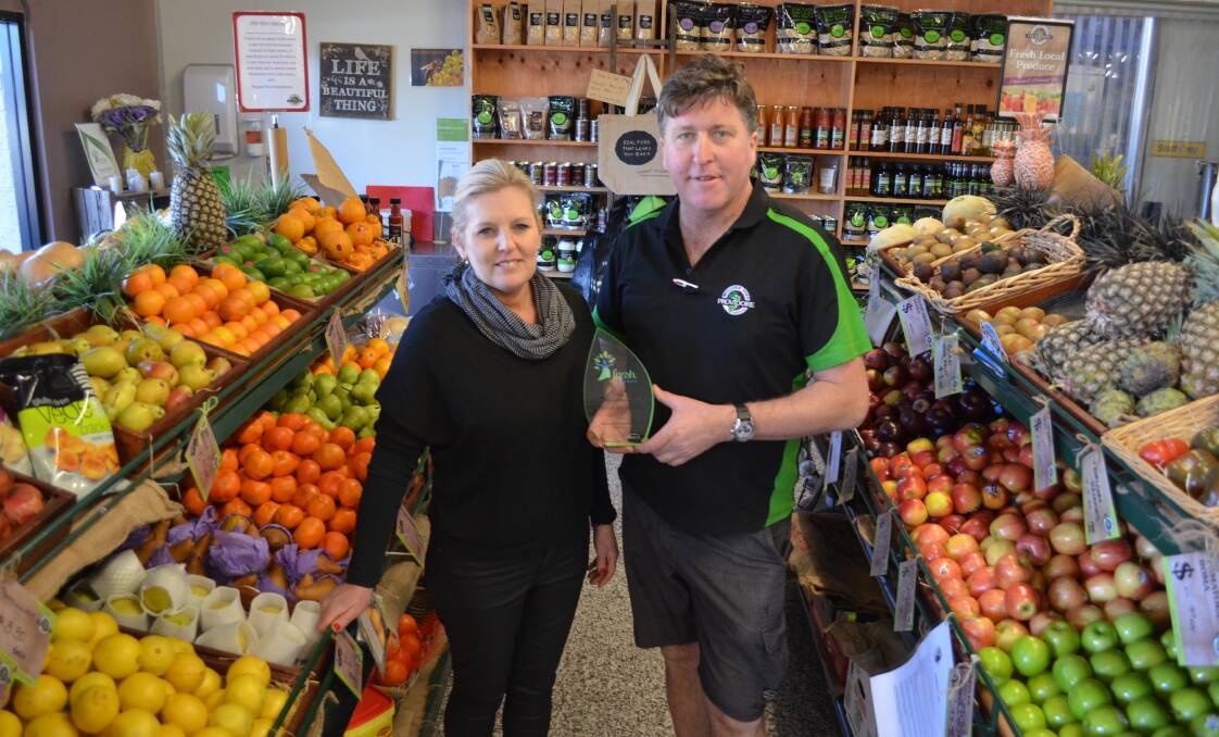 RECOGNITION: Wollombi Road Providore owners Lisa Cussen and Michael Jenness with their trophy from the Sydney Markets Fresh Awards.
