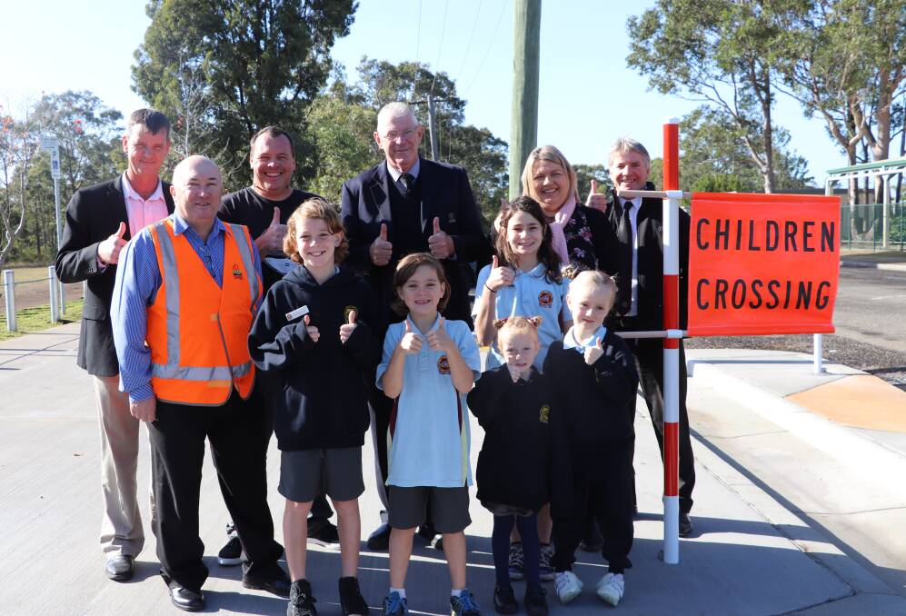 SAFETY: Cessnock City Council staff, teachers, parents and students welcome the completed works at Pelaw Main Public School. Picture: supplied