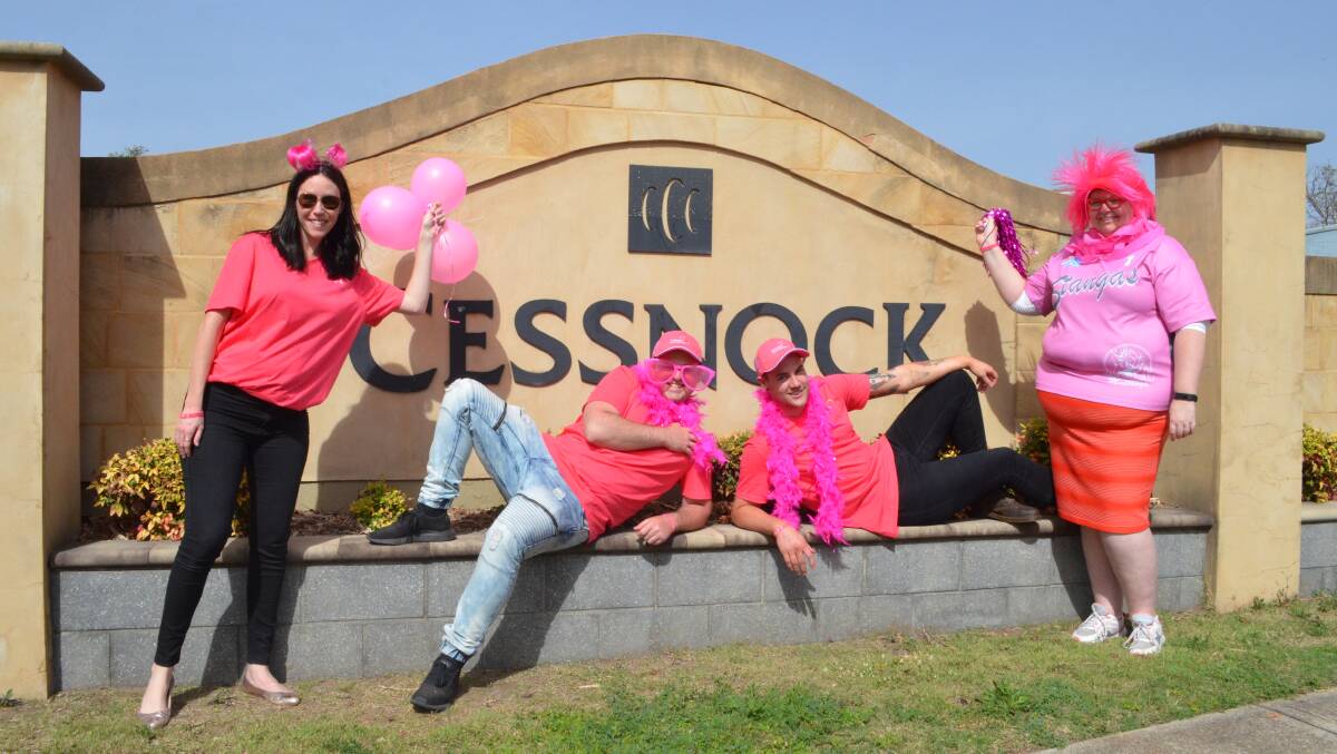 BRIGHT: Cessnock Pink Up Your Town committee members Laura Andrew, Adam Robinson, Shane Wilson and Stacy Jacobs, spreading the message in Cessnock on Monday. Picture: Krystal Sellars