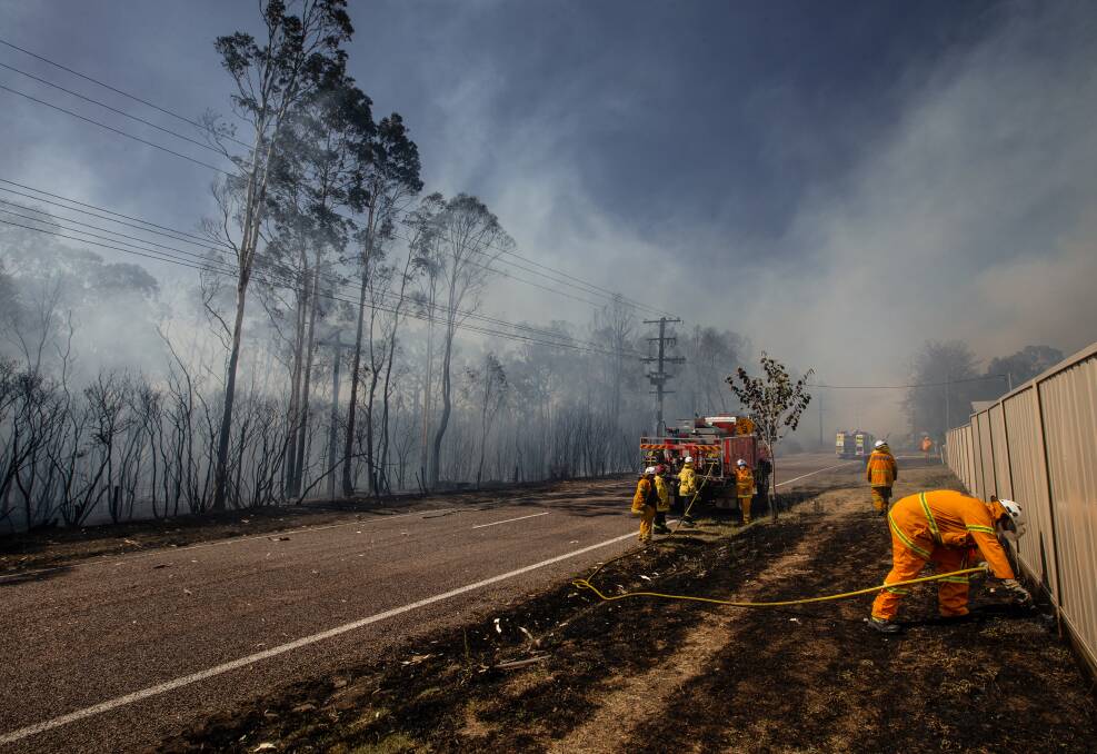 SCARE: A fast-moving bushfire on Wine Country Drive, North Rothbury last November. Picture: Marina Neil