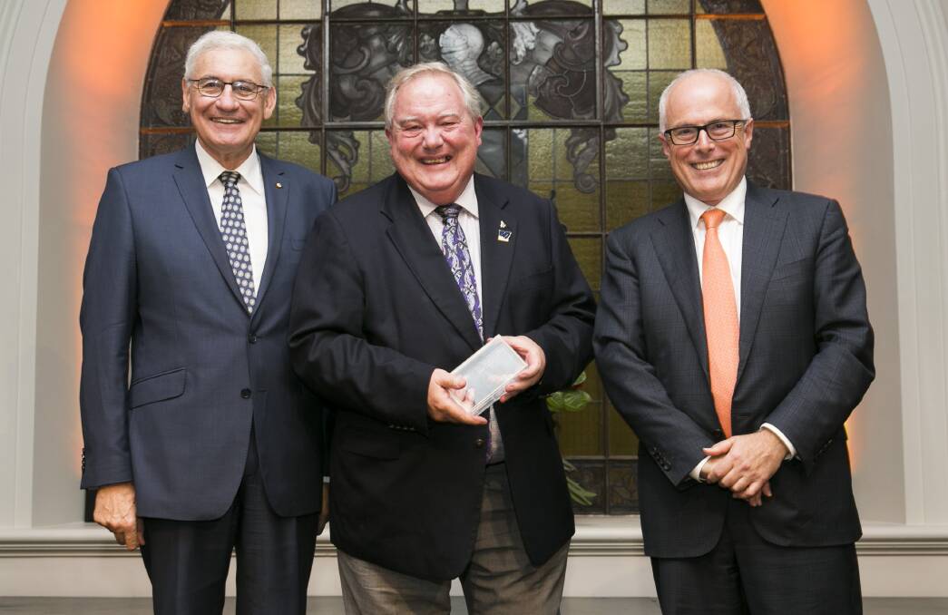 RECOGNITION: Graham Smith (centre) with Library Council of NSW president George Souris (left) and NSW State Librarian and State Library of NSW CEO, Dr John Vallance. Picture: State Library of NSW