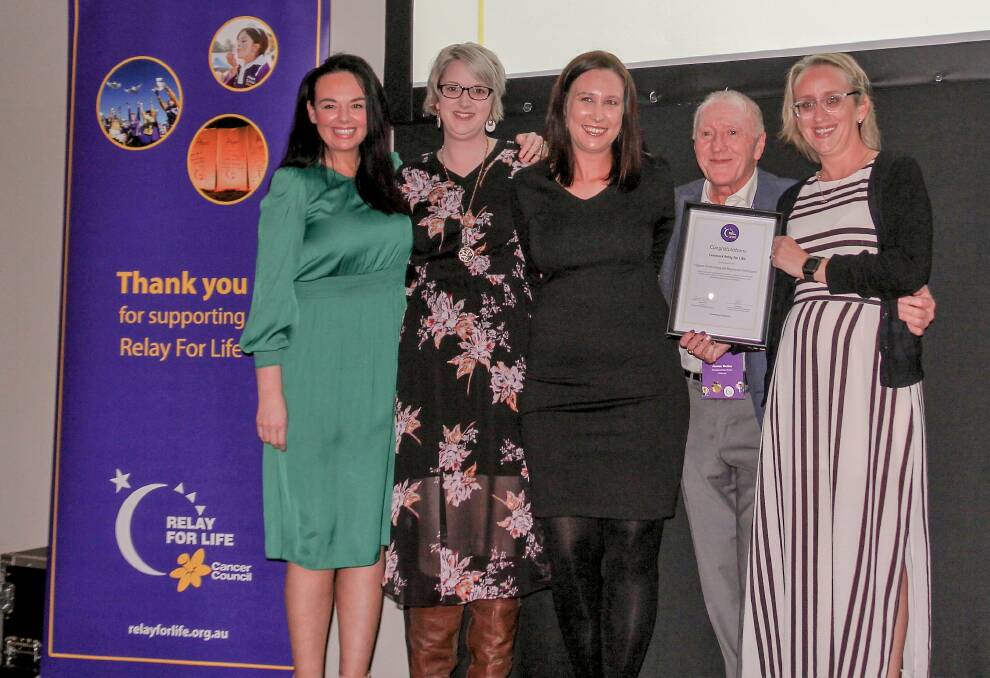 AWARD: Cessnock Relay For Life committee members Emma Ekert, Marlie Caban and Kasey Mazur with Cancer Council NSW's Lyndsey Rice and James Butler at the summit.