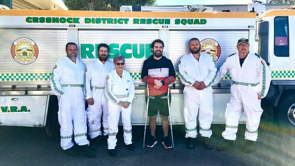 THANK YOU: Mathew Brown with Cessnock District Rescue Squad volunteers last month. Picture: Cessnock District Rescue Squad