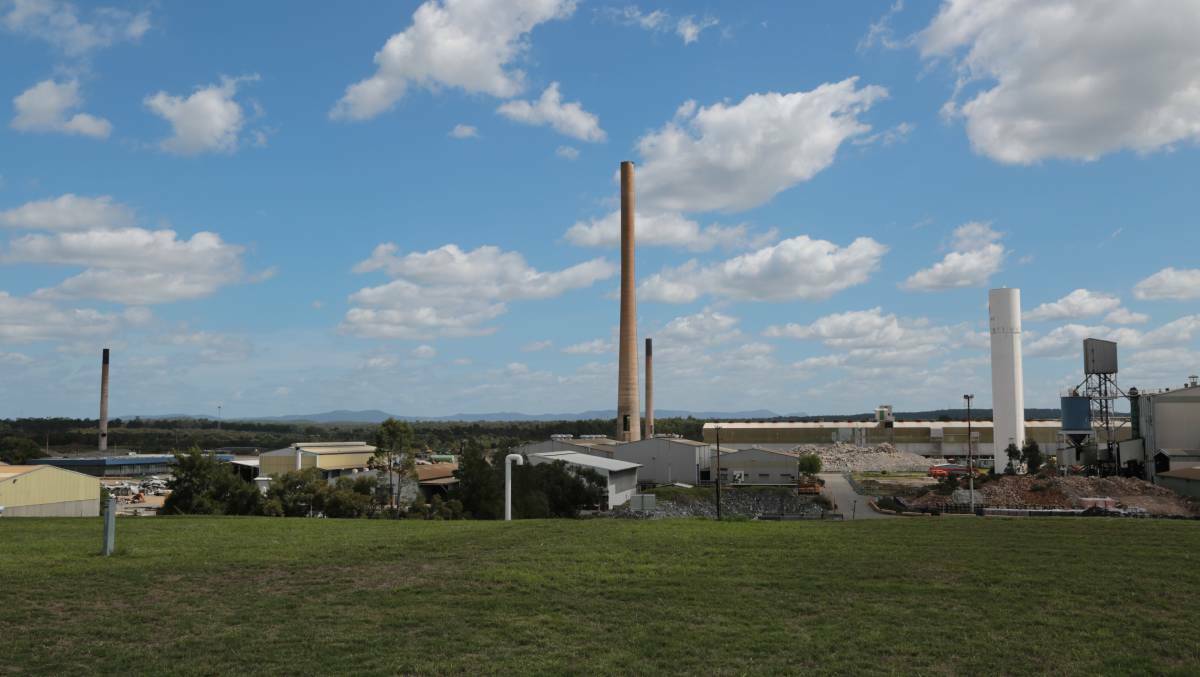 REDEVELOPMENT: The iconic stacks at the former Hydro Aluminium site, before they were demolished in May 2019.