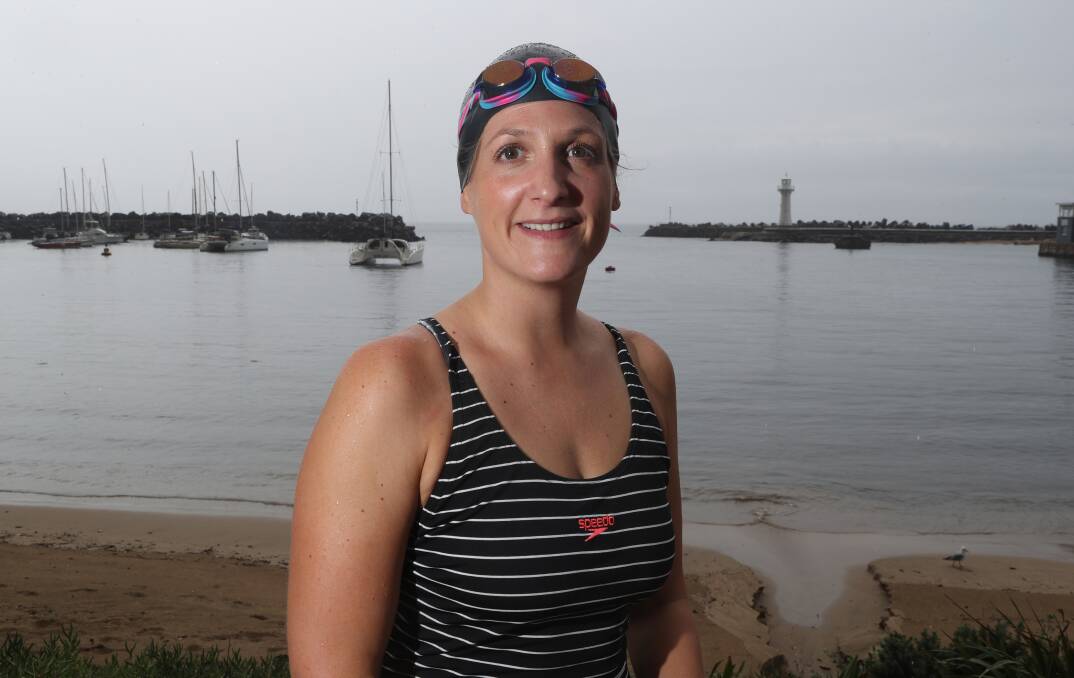 HARD WORK: Kate Brett prepares for a swim at Belmore Basin ahead of Sunday's Australia Day Aquathon. Picture: Robert Peet
