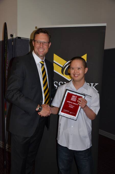WELL-DESERVED: Cessnock Leagues Club CEO Paul Cousins congratulations 2017 Overall winner Jordyn Threlfo at last year's awards. Picture: Krystal Sellars