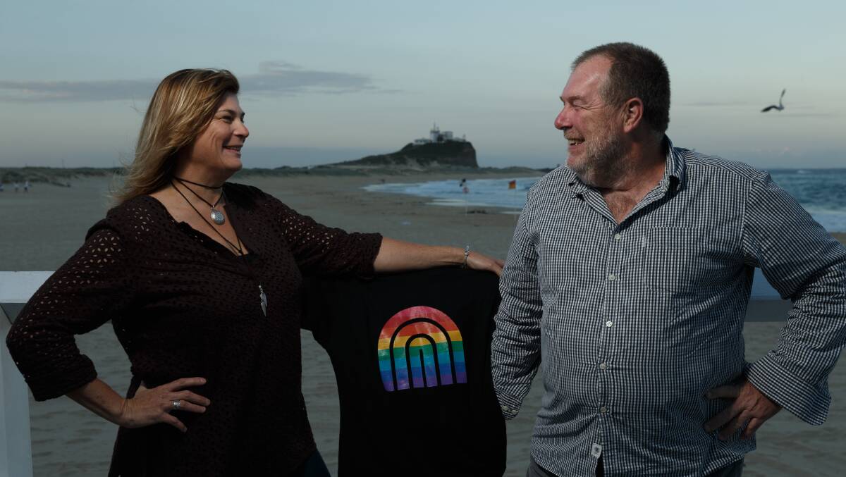RAINBOW: Organisers Lee-Anne McDougall and Ivan Skaines with one of the Newcastle Pride festival's t-shirts. Picture: Max Mason-Hubers