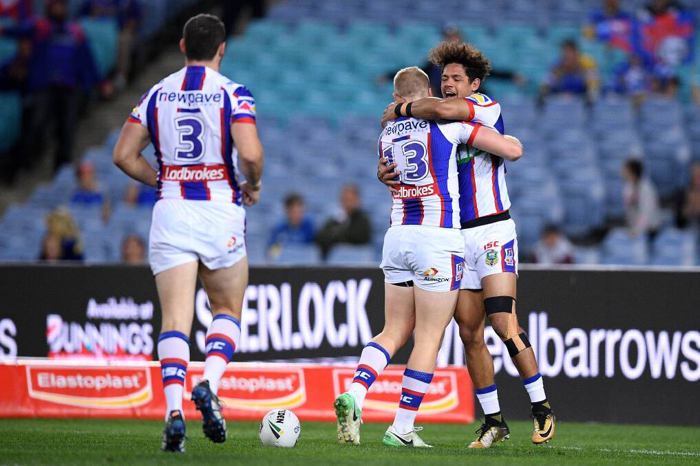 YOU BEAUTY: Dane Gagai congratulates Mitch Barnett after his early try. Picture: AAP