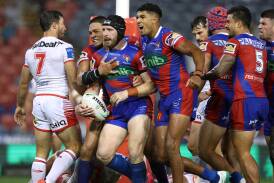 The Knights celebrate Jackson Hastings' early try. Picture Getty Images