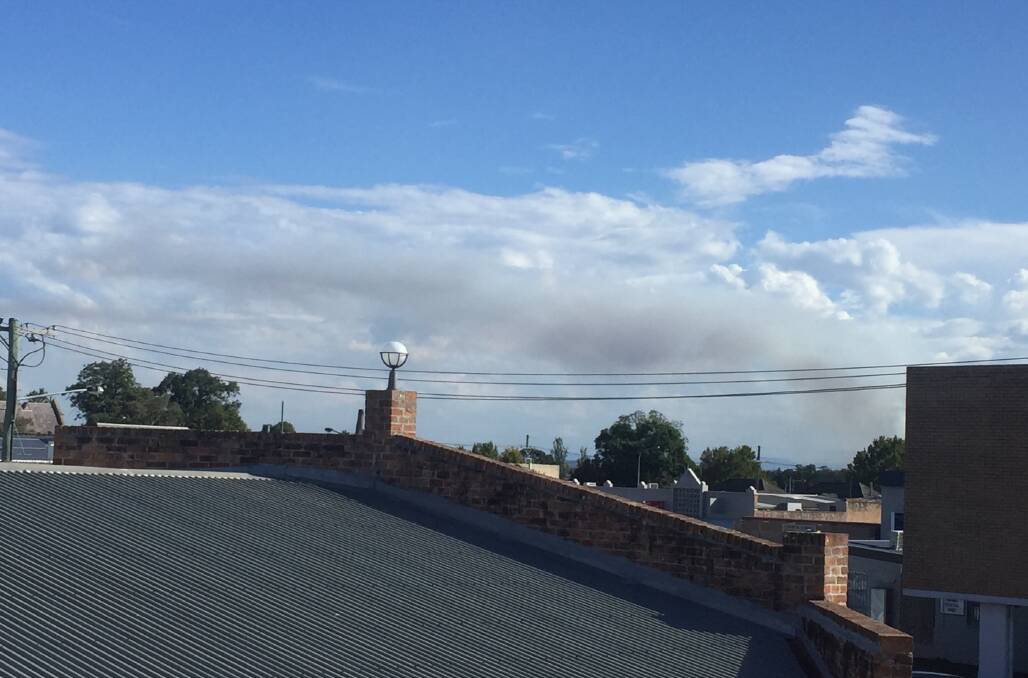 NO CAUSE FOR ALARM: Smoke seen at Abermain from Maitland on Thursday.