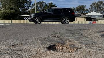 GRAVEL: Pothole at the intersection of President Wilson Walk and Lemon Tree Passage Road, Tanilba Bay. Picture: Simone De Peak