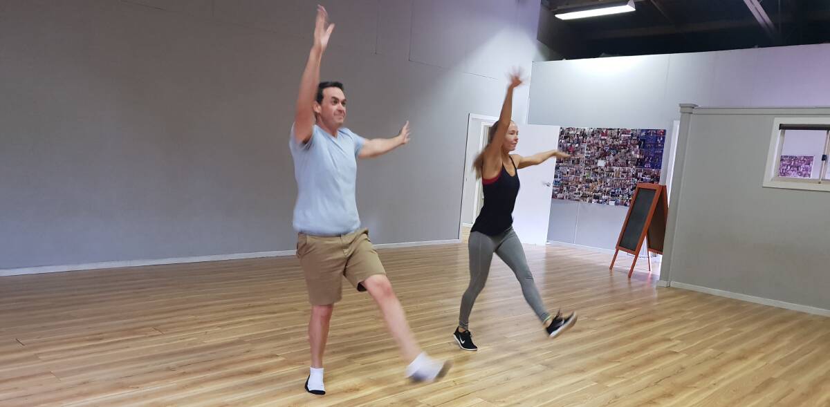 KICK: Anthony Burke with dance partner Emma Baillie from Pure Talent School of Excellence. His genre is disco.