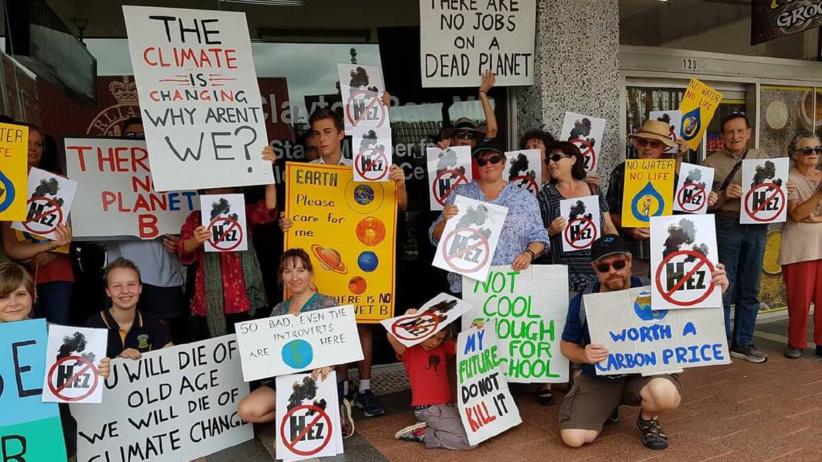 PROTEST: Participants in Cessnock's School Strike 4 Climate outside Clayton Barr's office on Friday.