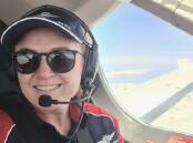 An in-flight happy Laura Koerbin, somewhere over Lake Gairdner, SA. Picture supplied