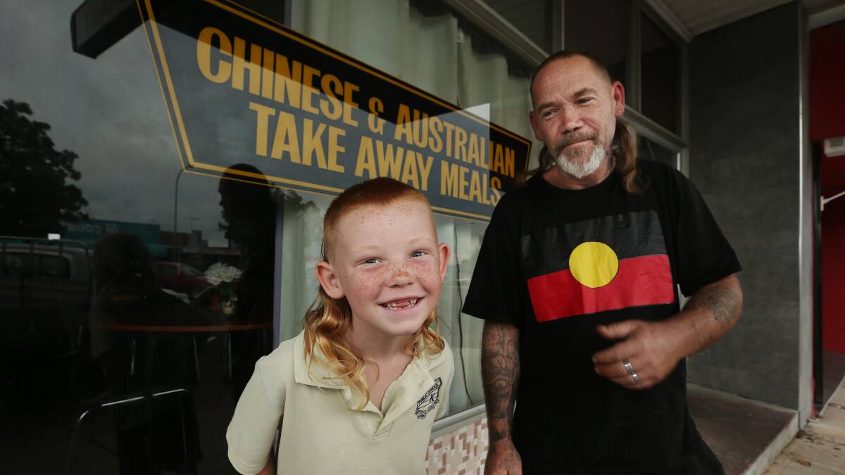 IN THE FAMILY: Beau Baker, 6, got a fresh trim for Mulltfest, with his dad Paul of Kurri Kurri.