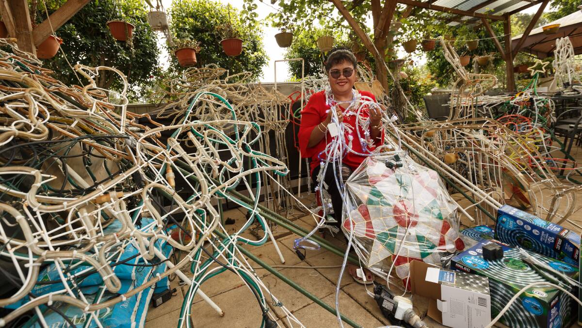 THE LONG JOURNEY BEGINS: Nulkaba's Cely Relf at the start of her month-long operation to get her magnificent Christmas light display ready for the public. Picture: Max Mason-Hubers