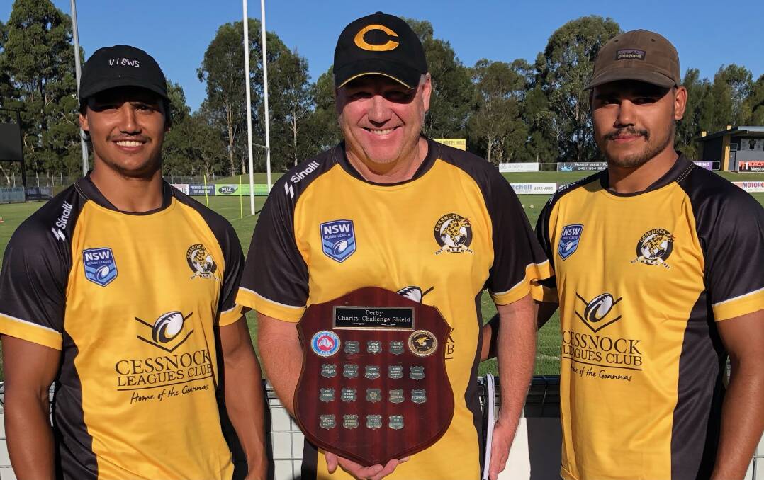 HAPPIER TIMES: Coach Todd Edwards with Gerome (left) and Denzel Burns ahead of the Charity Shield clash with Kurri. 