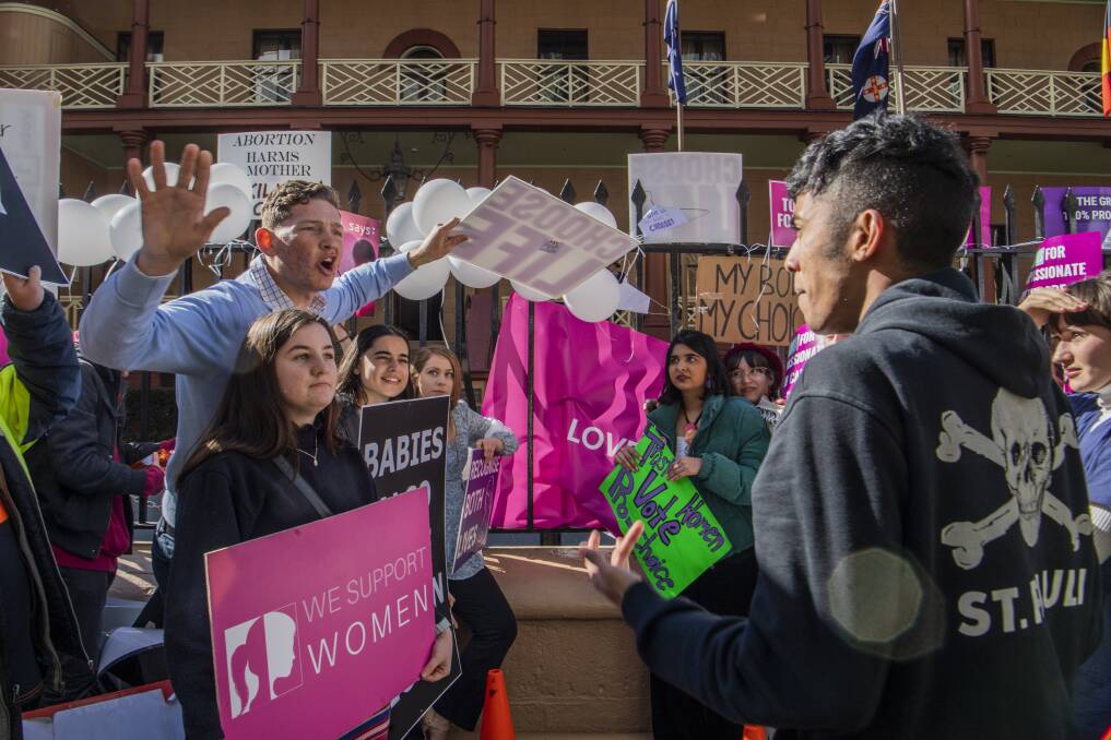 HEATED: Protesters at NSW Parliament House, where the Lower House last week passed a bill to decriminalise abortion. Picture: AAP