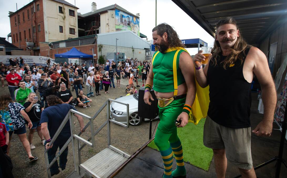 THE ENTRY: Mediocre Mullter Man, Josh Hogg, makes his grand entrance to the stage. Pictures Simone De Peak.