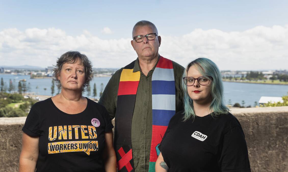 Hunter Community Alliance members Teresa Hetherington, Reverend Rob Hanks and Shaylie Pryer in Newcastle on Friday. Picture by Marina Neil