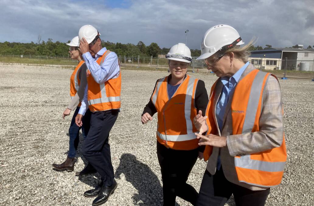 FIRED UP: Brooke Vitnell, Angus Taylor, Nell McGill and Sussan Ley at the Kurri Kurri plant site on Monday morning.