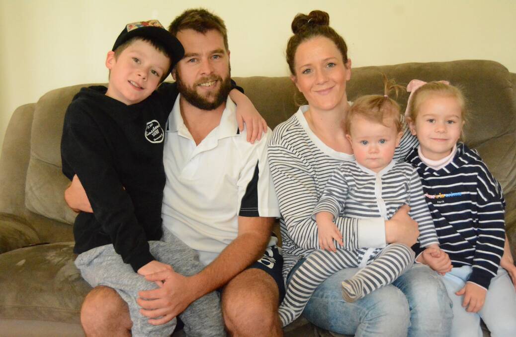 Family: Mark and Lydia Collins at home with their children Max, Willow and Poppy.