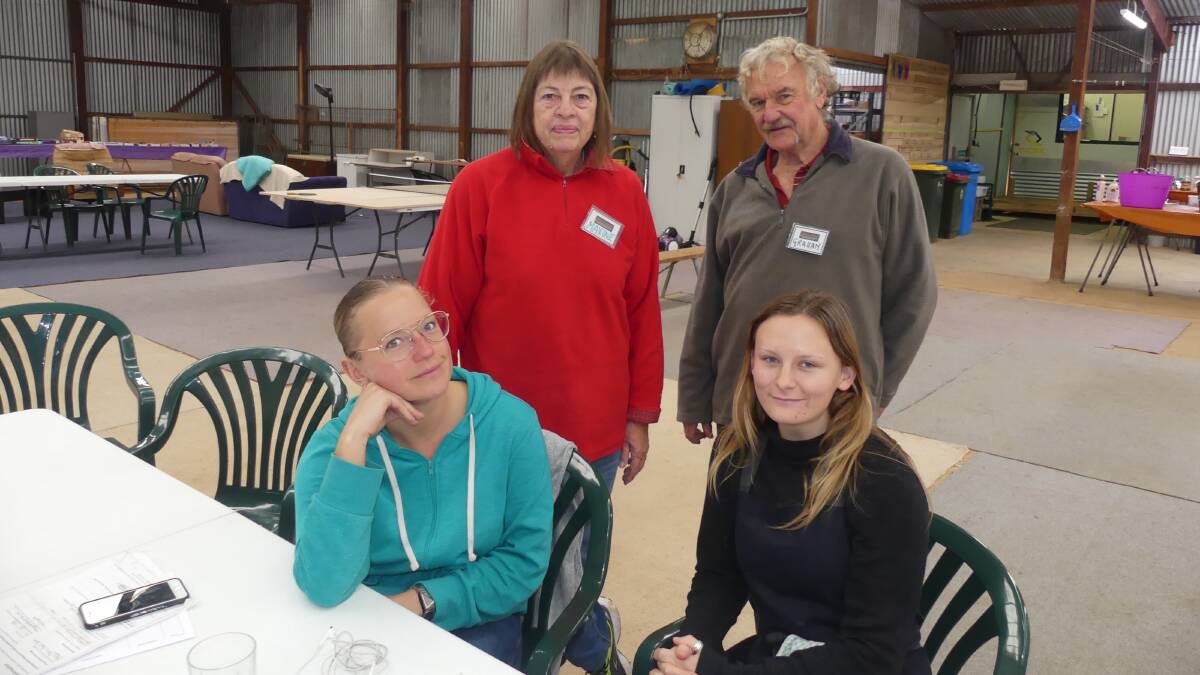 BlazeAid camp coordinators Maxine and Graham at the Parndana Showgrounds camp with backpackers volunteering with the fencing program, Kelly Geven from Stein, Holland and Rikayla Baldin from Granite Island, Canada.