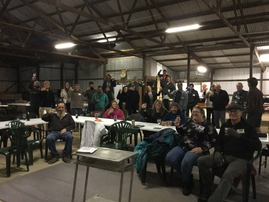 The BlazeAid volunteers celebrate the milestone of 500 kilometres of new fencing on Kangaroo Island. Photo Blaze Aid Kangaroo Island Facebook page