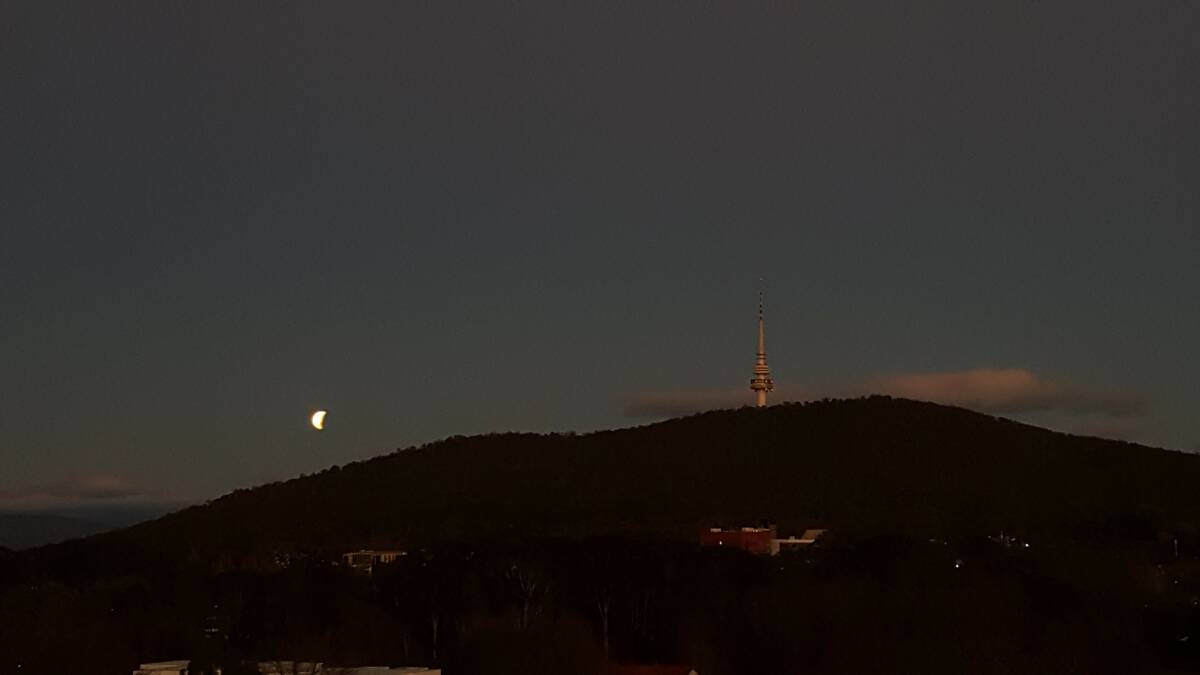 The lunar eclipse seen on Canberra on Wednesday morning. Picture: Sally Jeffery