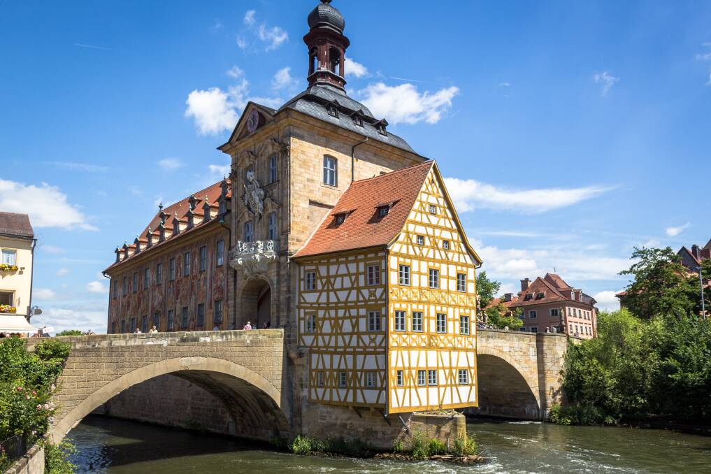 The Town Hall of Bamberg, built over a bridge across a river to protect it from attackers.
