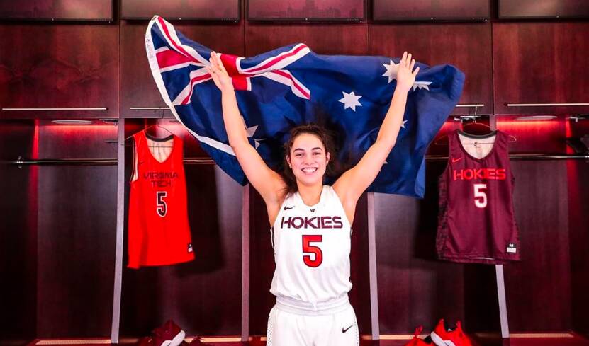 SCHOLARSHIP: Georgia Amoore shows off her new Virginia Tech basketball uniform while flying the Australian flag. Picture: Supplied.