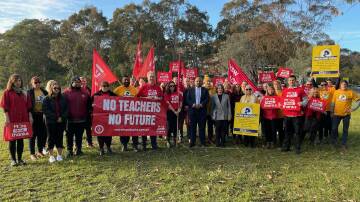 One voice: Federation deputy president Henry Rajendra and IEU NSW/ACT deputy secretary Carol Matthews met with teachers in Newcastle on Wednesday, ahead of the historic joint strike on Thursday. 