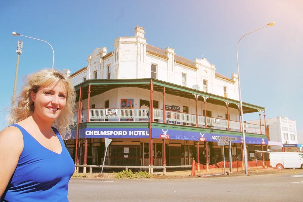 Laura Johnson outside the Chelmsford Hotel in Kurri Kurri, home to the Mulletfest.