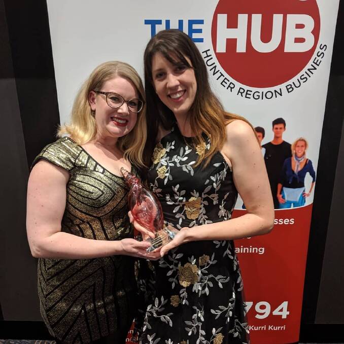 Sheree Chambers, Company Director of Brugel Creative and Erin Sessions, Communications Manager with the award for Internet Based Business for 2019.