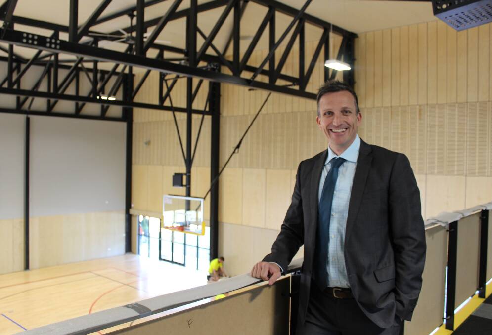 PRIDE: Principal of St Philip's Christian College in Cessnock, Darren Cox in the newly completed sports centre at the school.