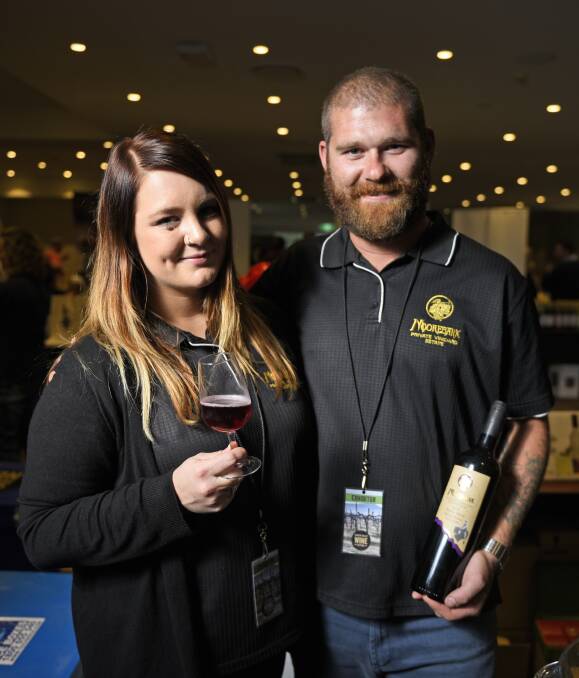 DRINK UP: Family-owned vineyard Moorebank exhibiting alongside the Hunter's biggest wineries. Pictured is the vineyard's heir Summar Burgess-Moore and her partner Jared Lilley. Picture: PERRY DUFFIN