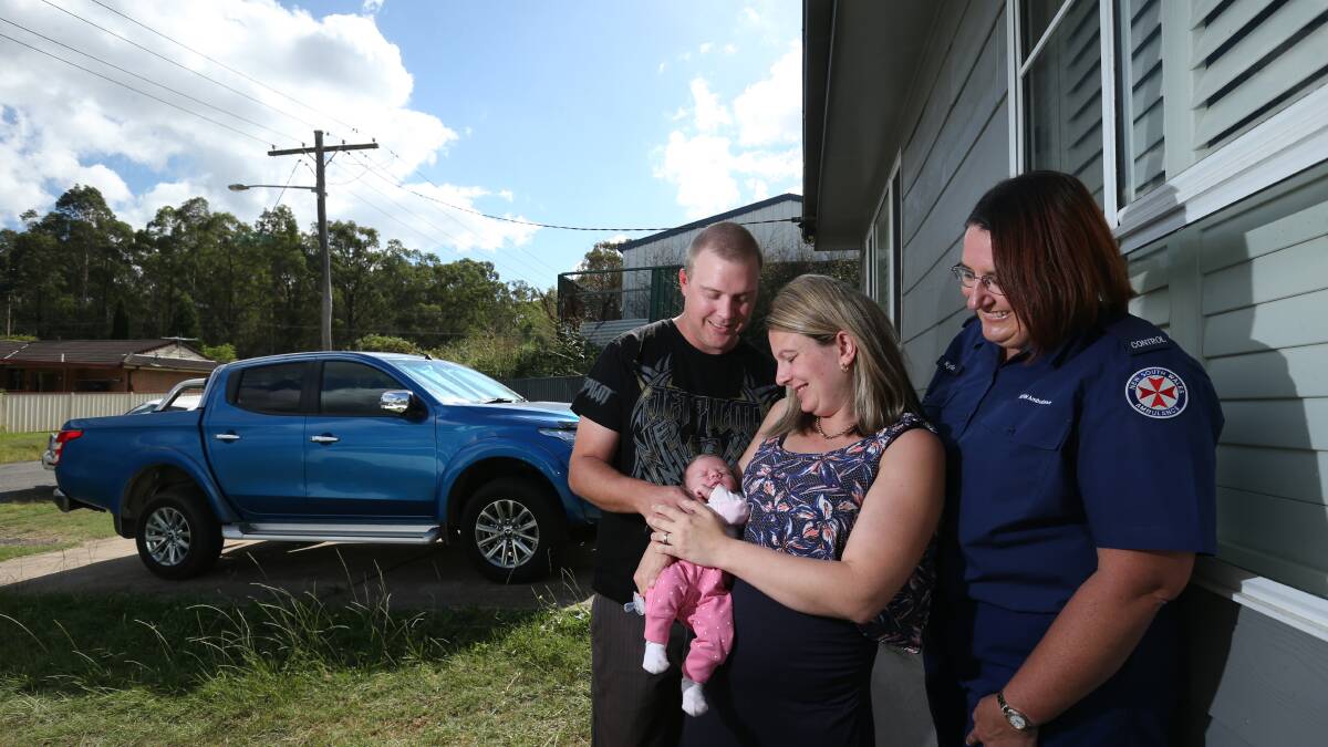 BUNDLE OF JOY: Jarrad, Aimie and Ivy Earl meet Triple Zero call-taker Kylie Crebert at Millfield on Tuesday, a week after Ivy was born on the side of the road near Cessnock with advice over the phone. Picture: Simone De Peak. 